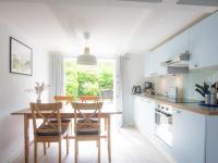 Haus Sonnenglück - Ferienwohnung Westerdeichstrich