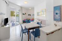 Bilocale TM frontemare con piscina - B&B Lignano Sabbiadoro