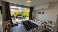 Lomener - La Goelette - studios à 450m de la plage - Chambres d'hôtes Ploemeur