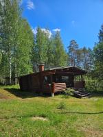 Perinteinen mökki järven rannalla - B&B Jongunjoki