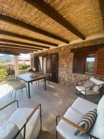 Villetta Tavolara Relax con giardino vicino al mare - B&B Monte Petrosu