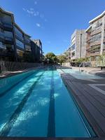 Departamento Familiar 4 personas, piscina, jardines y estacionamiento a pasos del centro de Pucón - Chambres d'hôtes Pucón