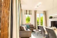 FIRST Waterkantsuite - Ferienwohnung Sellin