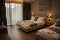 Dreibettzimmer mit Balkon