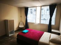 Tweepersoonskamer met 2 Aparte Bedden