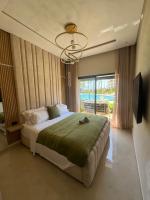 Appartement de luxe avec vue et acces sur piscine - Chambres d'hôtes Bouznika