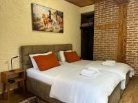 Tweepersoonskamer met 2 Aparte Bedden