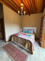 Chambre Lit Queen-Size Deluxe