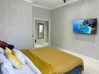 Cozy Apartment Sat City - B&B Astana