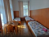 Chambre Triple avec Salle de Bains Commune