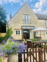 The Old Coach house- a delightful home from home - Ferienwohnung Witney