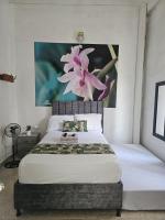 Tweepersoonskamer met 1 of 2 Bedden en Gedeelde Badkamer