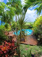 Gites kaz à klemence - Bungalow karapat - jacuzzi privé et piscine au cœur de la nature à Anse-Bertrand - Ferienwohnung Anse-Bertrand