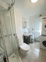 Cozy 2-Bedroom Apartment Med Eli bil lading mulighet - B&B Kristiansand