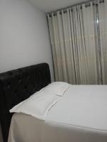 Apartamento simples e central - Bed and Breakfast Contagem