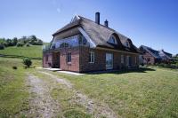 wassernahes Ferienhaus mit Meerblick und Schwimmbadnutzung in Sellin - Ferienhaus Rohrweihe - Chambres d'hôtes Gager