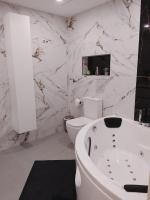 Deluxe Tweepersoonskamer met 1 of 2 Bedden en Bubbelbad