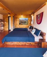 Dreibettzimmer mit Bergblick