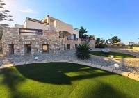 PetraCasa Luxury Villa - Chambres d'hôtes Azólimnos