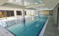 BlackForestbnb SeeNestchen - Modernes 3 Zimmer Appartement - Südbalkon - Schwimmbad - Sauna - Fitness - Chambres d'hôtes Schluchsee