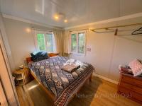 AAK cabin - standalone riverfront cabin - B&B Malanda