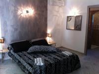 Camera Quadrupla con Vista Giardino e Vista Piscina