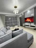 supreme living one bedroom apartments with swimming pool, fully equipped gym, ample parking space children playground and amazing city views - Chambres d'hôtes Nairobi