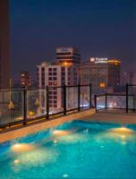 Onyx, 1BR, Gulberg Center, Parkhouse, Self-Checkin, Pool - Chambres d'hôtes Lahore