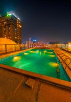 Onyx, 1BR, Gulberg Center, Parkhouse, Self-Checkin, Pool - Chambres d'hôtes Lahore