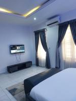 Bedroom Lekki ASPEN Court & more rooms - Chambres d'hôtes Ikate