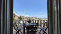 Il balcone sul borgo - B&B Aci Castello