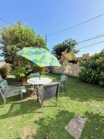 Breezy 1 bed apt, short ride from airport and beach - Chambres d'hôtes San Juan