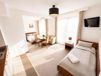 Deluxe Triple Room with Kitchenette