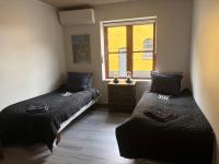 Habitación Doble con baño privado y acceso a una cocina compartida - 1 o 2 camas