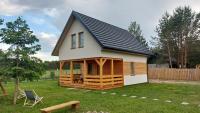 Dom nad jeziorem Serwy - B&B Serwy