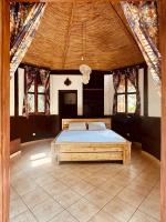 Campement Nyabinghi eco-lodge - Chambres d'hôtes Niaga
