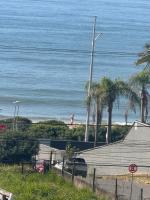 Apartamento completo a 50m da praia, com vista mar - Chambres d'hôtes Bugres