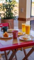 Recanto Sol da Chapada | Aptos no Centro com Garagem e Café da Manhã - B&B Alto Paraíso de Goiás