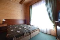Chambre Deluxe Double ou Lits Jumeaux