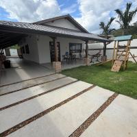 Casa em Massaguaçu em condomínio com piscina, Playground e mesa de bilhar - B&B Caraguatatuba