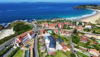 Apartamentos con piscina frente a la Playa de Paxariñas - Ferienwohnung Sanxenxo