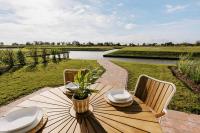 Küsten Suite Grachten Suite 2 direkte Wasserlage, Terrasse, 76qm, Neubaugebiet - B&B Greetsiel