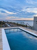 Edificio Paraná Playa Costanera, Apartamento de 1 Habitación, vista frontal al Rio con parking y Amenities! - Chambres d'hôtes Encarnación