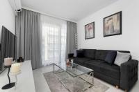 Nowoczesny Apartament z Balkonem Blisko Plaży by Noclegi Renters - Ferienwohnung Misdroy