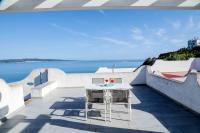 Luxury Beachfront Villa Kaleidos - Bed and Breakfast Calasetta