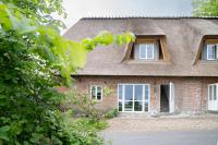 Das Reetdachhaus der Familie Sommer - Chambres d'hôtes Scheggerott