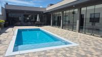Casa Temporada Paris Thermas dos Laranjais3-Suites - Chambres d'hôtes Olímpia