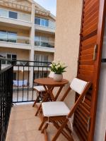 Apartman Petar - Porto Đenovići - Chambres d'hôtes Ðenovići