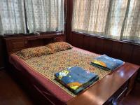 Kamer met Queensize Bed en Uitzicht op de Tuin