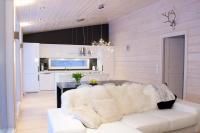 Aurinkotörmä - B&B Kuusamo